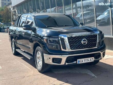 Черный Ниссан Титан, объемом двигателя 5.6 л и пробегом 69 тыс. км за 39999 $, фото 1 на Automoto.ua
