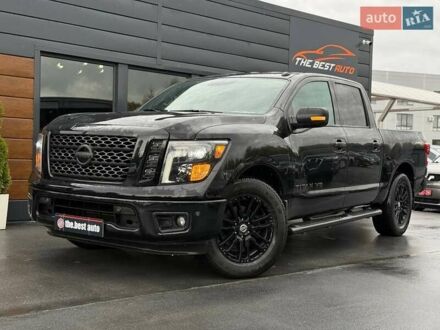 Черный Ниссан Титан, объемом двигателя 5.56 л и пробегом 160 тыс. км за 29999 $, фото 1 на Automoto.ua