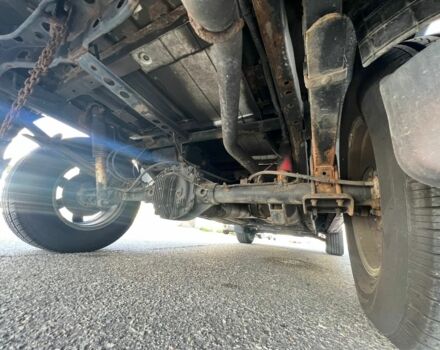 Красный Ниссан Титан, объемом двигателя 5.6 л и пробегом 270 тыс. км за 8500 $, фото 10 на Automoto.ua