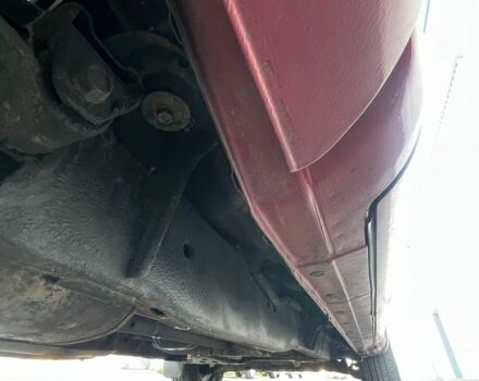 Красный Ниссан Титан, объемом двигателя 5.6 л и пробегом 270 тыс. км за 8500 $, фото 7 на Automoto.ua