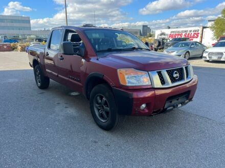 Красный Ниссан Титан, объемом двигателя 5.6 л и пробегом 270 тыс. км за 8500 $, фото 1 на Automoto.ua