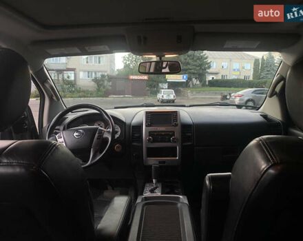 Серый Ниссан Титан, объемом двигателя 5.55 л и пробегом 143 тыс. км за 19500 $, фото 3 на Automoto.ua