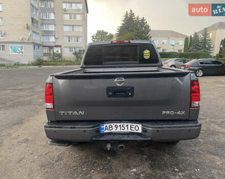 Серый Ниссан Титан, объемом двигателя 5.55 л и пробегом 143 тыс. км за 19500 $, фото 6 на Automoto.ua