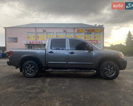 Серый Ниссан Титан, объемом двигателя 5.55 л и пробегом 143 тыс. км за 19500 $, фото 2 на Automoto.ua
