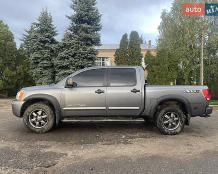 Серый Ниссан Титан, объемом двигателя 5.55 л и пробегом 143 тыс. км за 19500 $, фото 5 на Automoto.ua