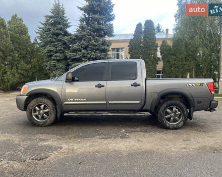 Серый Ниссан Титан, объемом двигателя 5.55 л и пробегом 143 тыс. км за 19500 $, фото 1 на Automoto.ua