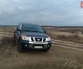 Синий Ниссан Титан, объемом двигателя 5.6 л и пробегом 112 тыс. км за 21298 $, фото 1 на Automoto.ua
