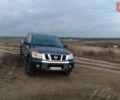 Синий Ниссан Титан, объемом двигателя 5.6 л и пробегом 112 тыс. км за 21298 $, фото 1 на Automoto.ua