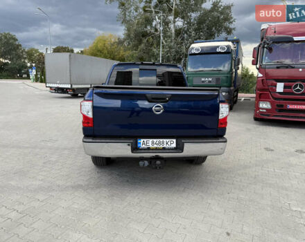 Синий Ниссан Титан, объемом двигателя 5.56 л и пробегом 145 тыс. км за 29500 $, фото 1 на Automoto.ua