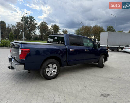 Синий Ниссан Титан, объемом двигателя 5.56 л и пробегом 145 тыс. км за 29500 $, фото 4 на Automoto.ua