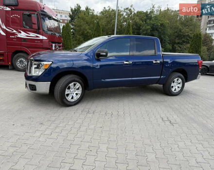 Синий Ниссан Титан, объемом двигателя 5.56 л и пробегом 145 тыс. км за 29500 $, фото 2 на Automoto.ua