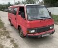 Красный Ниссан Урван, объемом двигателя 2.5 л и пробегом 300 тыс. км за 900 $, фото 1 на Automoto.ua