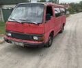 Красный Ниссан Урван, объемом двигателя 2.5 л и пробегом 300 тыс. км за 900 $, фото 1 на Automoto.ua