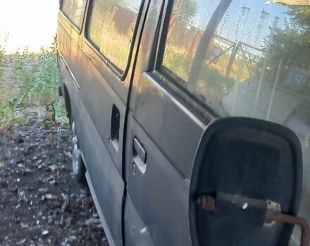 Синій Ніссан Урван, об'ємом двигуна 2.3 л та пробігом 300 тис. км за 387 $, фото 4 на Automoto.ua