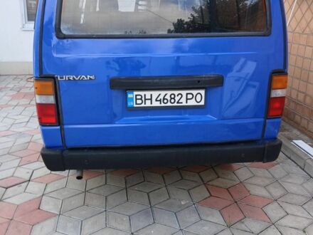 Синий Ниссан Урван, объемом двигателя 2.3 л и пробегом 240 тыс. км за 1600 $, фото 1 на Automoto.ua