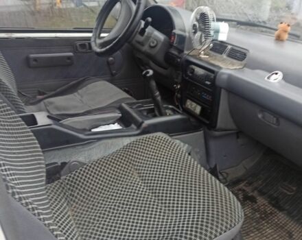 Белый Ниссан Ванетте, объемом двигателя 2.3 л и пробегом 350 тыс. км за 1776 $, фото 2 на Automoto.ua