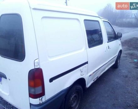 Белый Ниссан Ванетте, объемом двигателя 2.3 л и пробегом 290 тыс. км за 3000 $, фото 2 на Automoto.ua