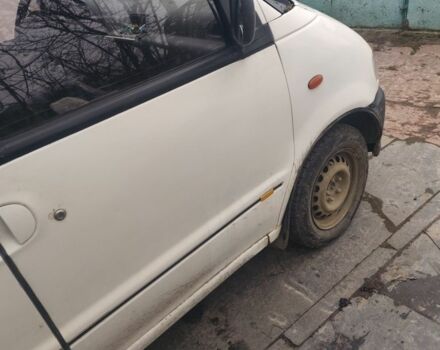 Белый Ниссан Ванетте, объемом двигателя 2.3 л и пробегом 385 тыс. км за 1200 $, фото 4 на Automoto.ua