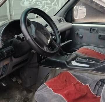 Белый Ниссан Ванетте, объемом двигателя 2.5 л и пробегом 320 тыс. км за 2200 $, фото 2 на Automoto.ua