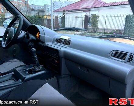 Белый Ниссан Ванетте, объемом двигателя 2.3 л и пробегом 300 тыс. км за 2950 $, фото 12 на Automoto.ua