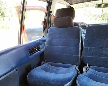 Красный Ниссан Ванетте, объемом двигателя 2 л и пробегом 340 тыс. км за 2500 $, фото 11 на Automoto.ua