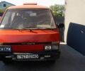 Красный Ниссан Ванетте, объемом двигателя 2 л и пробегом 320 тыс. км за 2574 $, фото 1 на Automoto.ua
