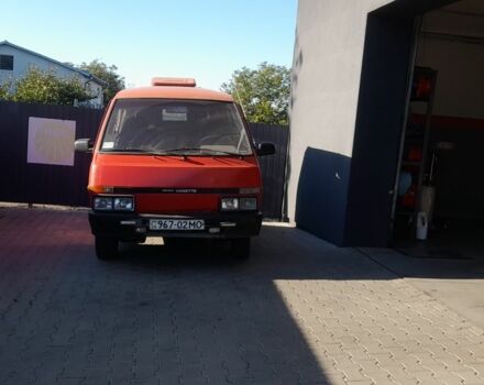 Красный Ниссан Ванетте, объемом двигателя 2 л и пробегом 320 тыс. км за 2574 $, фото 3 на Automoto.ua