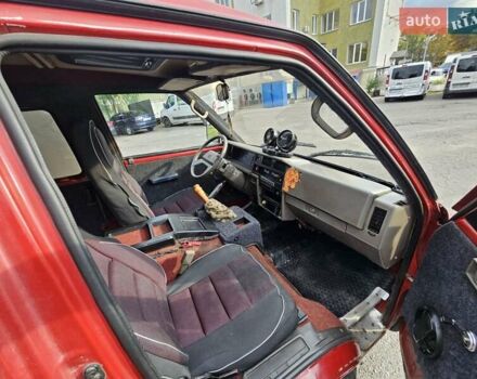 Красный Ниссан Ванетте, объемом двигателя 1.95 л и пробегом 237 тыс. км за 1800 $, фото 4 на Automoto.ua