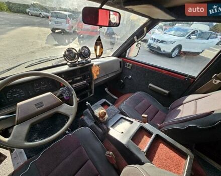 Красный Ниссан Ванетте, объемом двигателя 1.95 л и пробегом 237 тыс. км за 1800 $, фото 6 на Automoto.ua