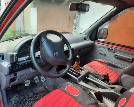 Красный Ниссан Ванетте, объемом двигателя 2.3 л и пробегом 370 тыс. км за 1277 $, фото 2 на Automoto.ua