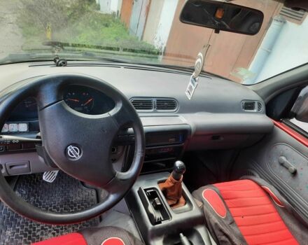 Красный Ниссан Ванетте, объемом двигателя 2.3 л и пробегом 370 тыс. км за 1277 $, фото 3 на Automoto.ua