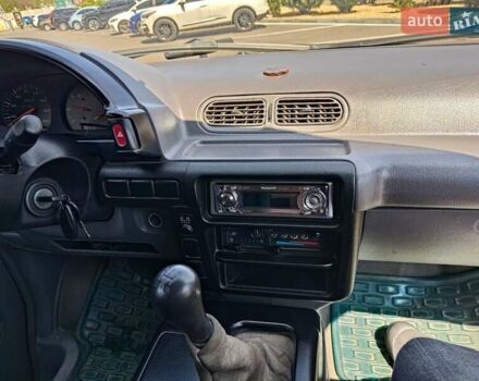 Красный Ниссан Ванетте, объемом двигателя 2.3 л и пробегом 213 тыс. км за 4950 $, фото 6 на Automoto.ua