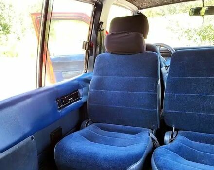 Червоний Ніссан Ванетте, об'ємом двигуна 2 л та пробігом 340 тис. км за 2500 $, фото 3 на Automoto.ua