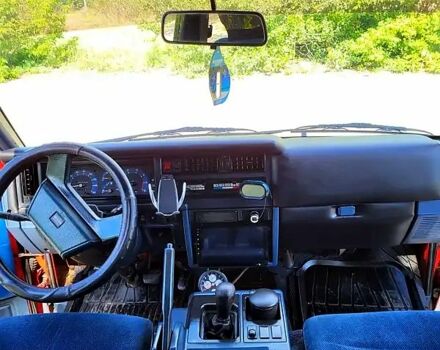 Червоний Ніссан Ванетте, об'ємом двигуна 2 л та пробігом 340 тис. км за 2500 $, фото 7 на Automoto.ua