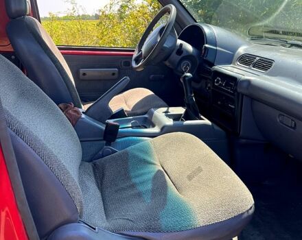 Красный Ниссан Ванетте, объемом двигателя 2.3 л и пробегом 300 тыс. км за 2100 $, фото 1 на Automoto.ua