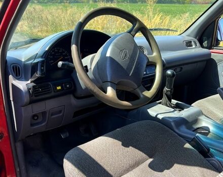 Красный Ниссан Ванетте, объемом двигателя 2.3 л и пробегом 300 тыс. км за 2100 $, фото 7 на Automoto.ua