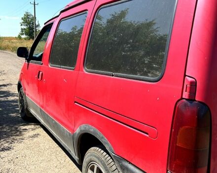 Красный Ниссан Ванетте, объемом двигателя 2.3 л и пробегом 300 тыс. км за 2100 $, фото 4 на Automoto.ua