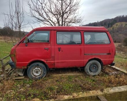Красный Ниссан Ванетте, объемом двигателя 2 л и пробегом 250 тыс. км за 600 $, фото 1 на Automoto.ua
