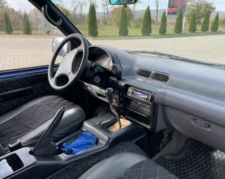 Синий Ниссан Ванетте, объемом двигателя 2.2 л и пробегом 300 тыс. км за 2850 $, фото 5 на Automoto.ua