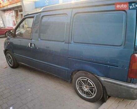 Синий Ниссан Ванетте, объемом двигателя 2.3 л и пробегом 250 тыс. км за 2410 $, фото 1 на Automoto.ua