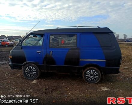 Синий Ниссан Ванетте, объемом двигателя 2 л и пробегом 300 тыс. км за 1500 $, фото 3 на Automoto.ua