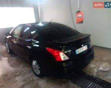 Черный Ниссан Верса, объемом двигателя 1.6 л и пробегом 80 тыс. км за 13000 $, фото 1 на Automoto.ua