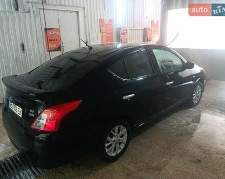 Черный Ниссан Верса, объемом двигателя 1.6 л и пробегом 80 тыс. км за 13000 $, фото 5 на Automoto.ua
