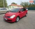 Красный Ниссан Верса, объемом двигателя 1.8 л и пробегом 207 тыс. км за 5500 $, фото 1 на Automoto.ua