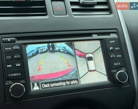 Красный Ниссан Верса, объемом двигателя 1.6 л и пробегом 125 тыс. км за 9300 $, фото 29 на Automoto.ua