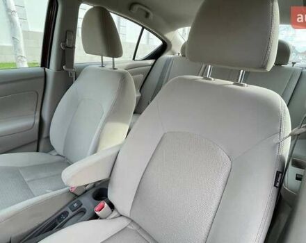 Красный Ниссан Верса, объемом двигателя 1.6 л и пробегом 45 тыс. км за 5800 $, фото 14 на Automoto.ua