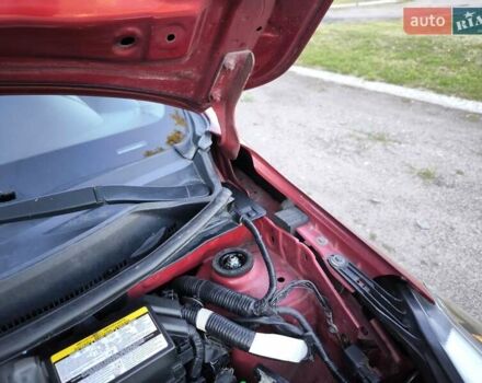 Червоний Ніссан Верса, об'ємом двигуна 1.6 л та пробігом 132 тис. км за 6799 $, фото 11 на Automoto.ua