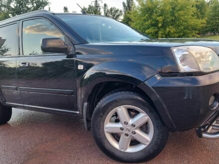 Черный Ниссан Икс-Терра, объемом двигателя 2.2 л и пробегом 270 тыс. км за 6000 $, фото 1 на Automoto.ua