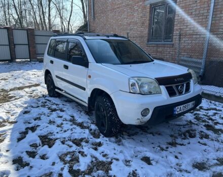 Белый Ниссан ИксТрейл, объемом двигателя 2 л и пробегом 300 тыс. км за 4000 $, фото 7 на Automoto.ua