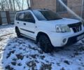 Белый Ниссан ИксТрейл, объемом двигателя 2 л и пробегом 300 тыс. км за 4000 $, фото 1 на Automoto.ua